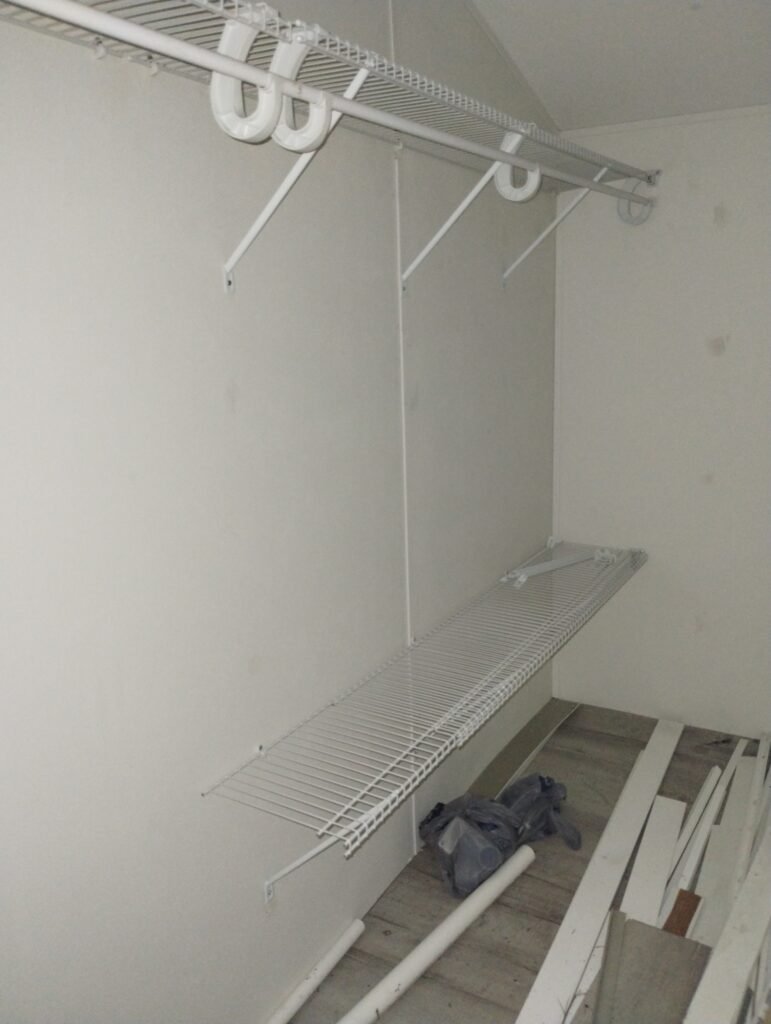 view into walk-in closet with wire shelves