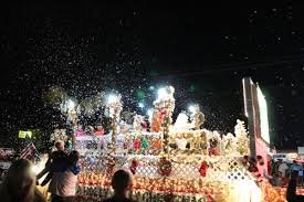 Christmas float lit up at night