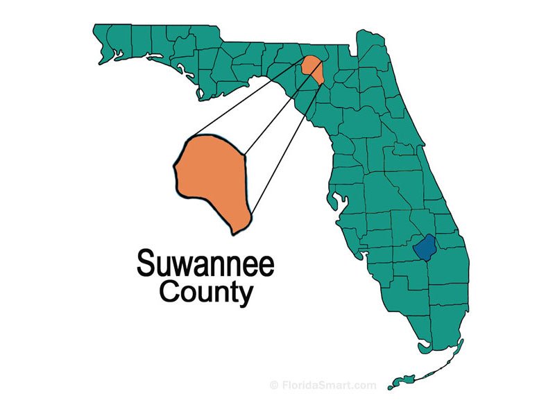 green map of Florida on a white background with Suwannee County highlighted in orange and projected out to the center there is a watermark at the bottom which reads © FloridaSmart.com